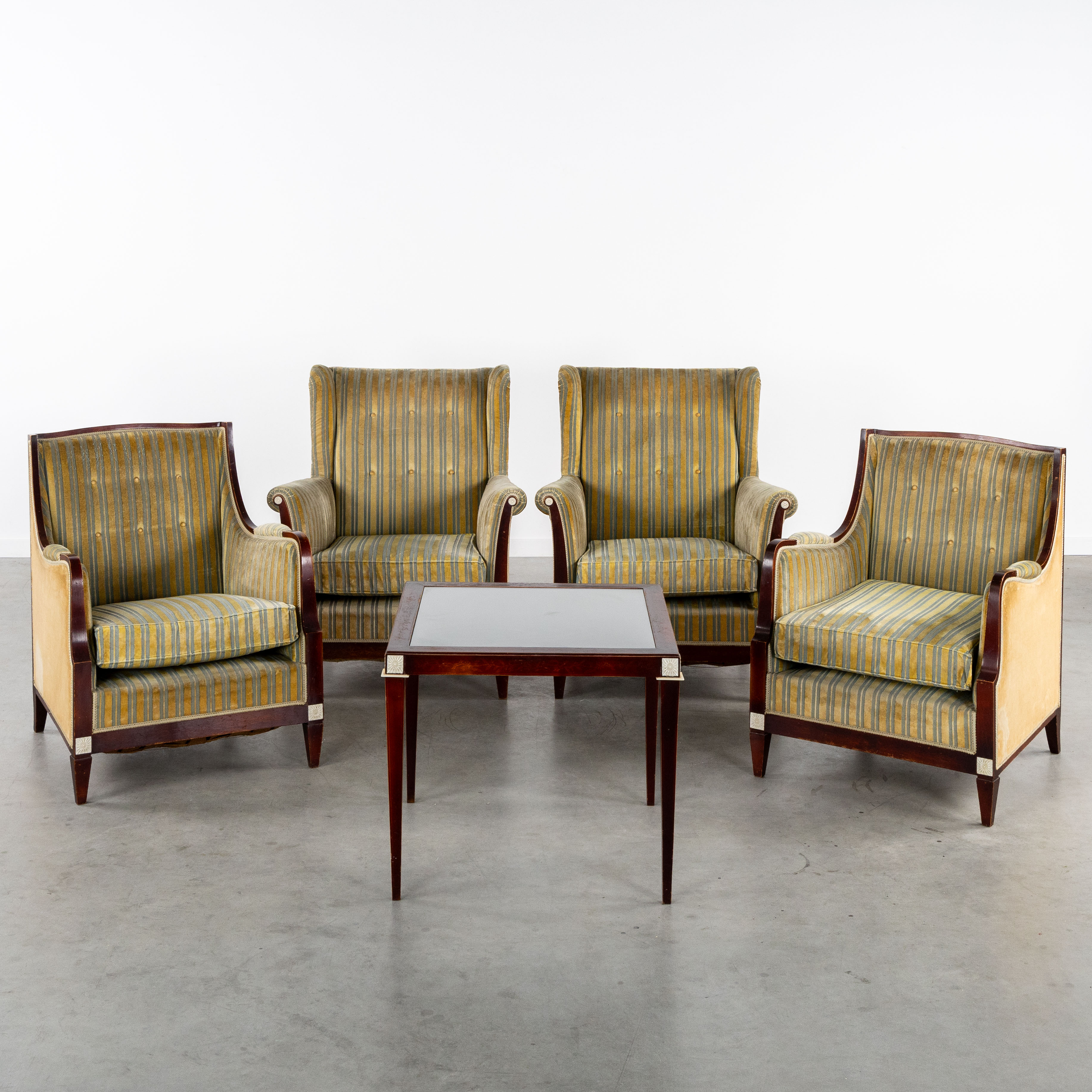 A Five-piece Biedermeier salon suite, with four armchairs and a coffee table, decorated with rosettes and inlay, circa 1920. (L:78 x W:72 x H:91 cm)